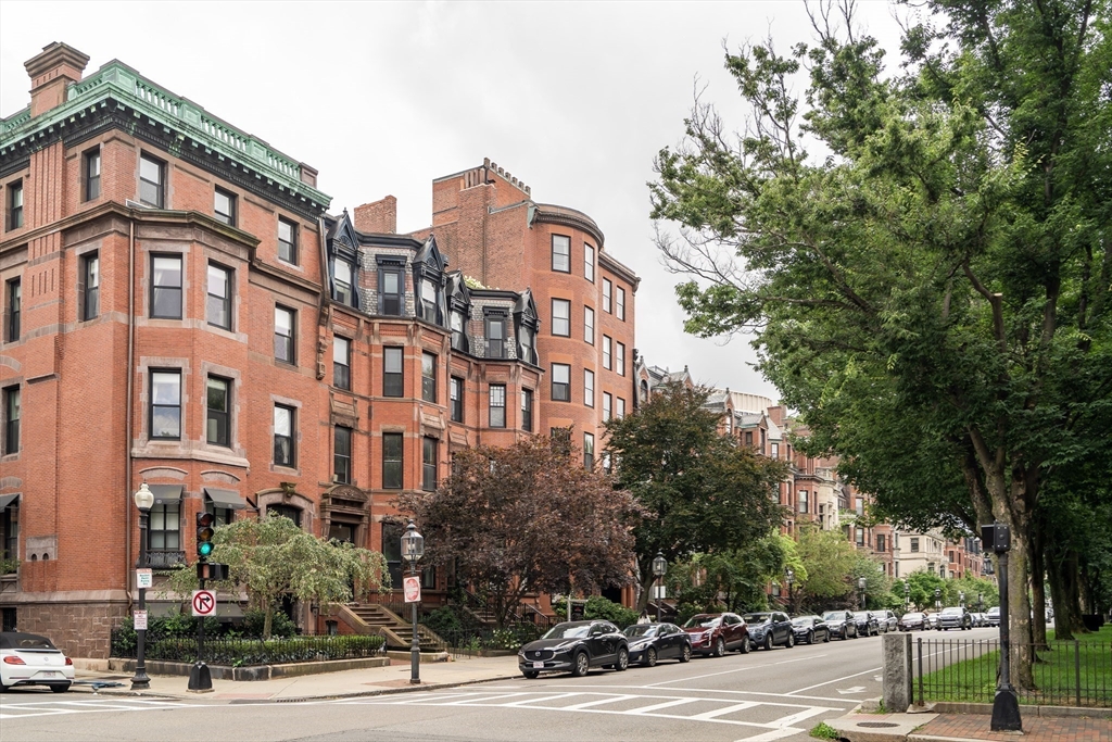 290 Commonwealth Avenue, Unit 8 Boston, MA 02115 - Photo 31 of 32 a view of a tall building next to a road