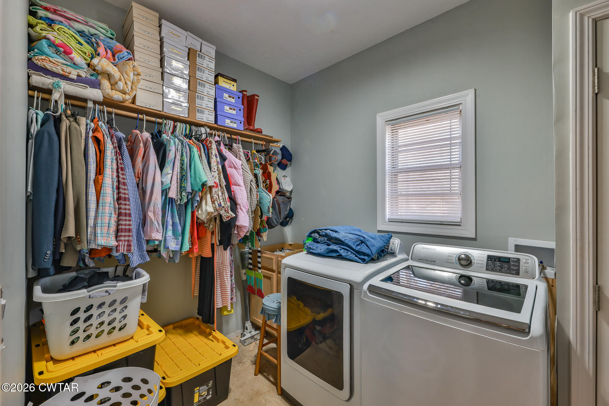 125 Old Dyer-Trenton Road Dyer, TN 38330 - Photo 13 of 40 a view of walk in closet with clothes and shoes