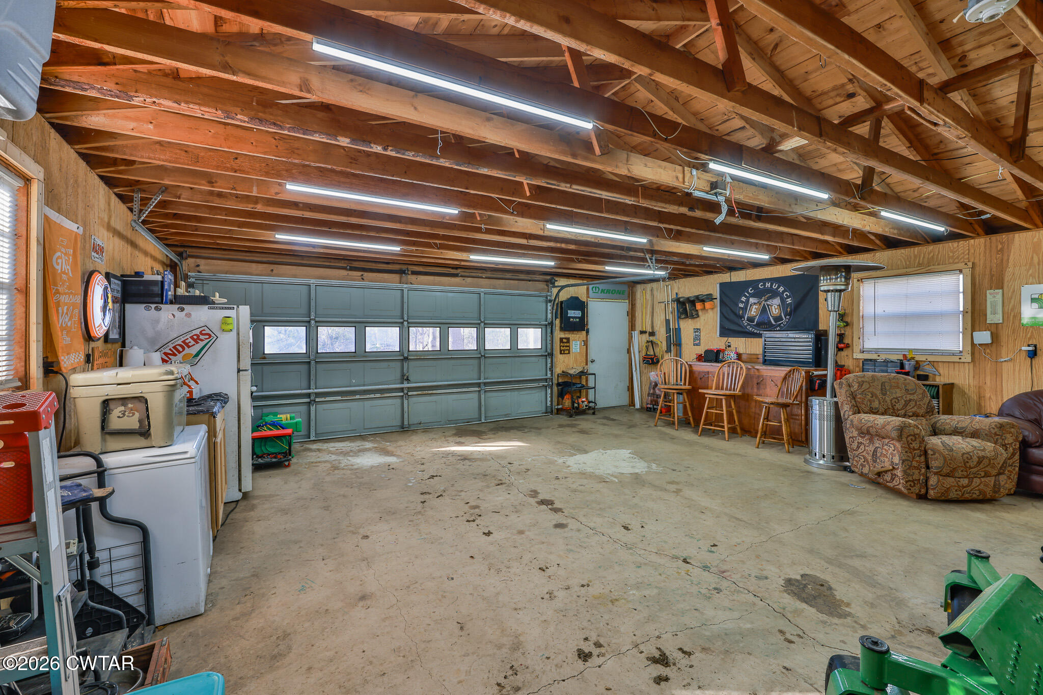 125 Old Dyer-Trenton Road Dyer, TN 38330 - Photo 17 of 40 a view of a garage with furniture