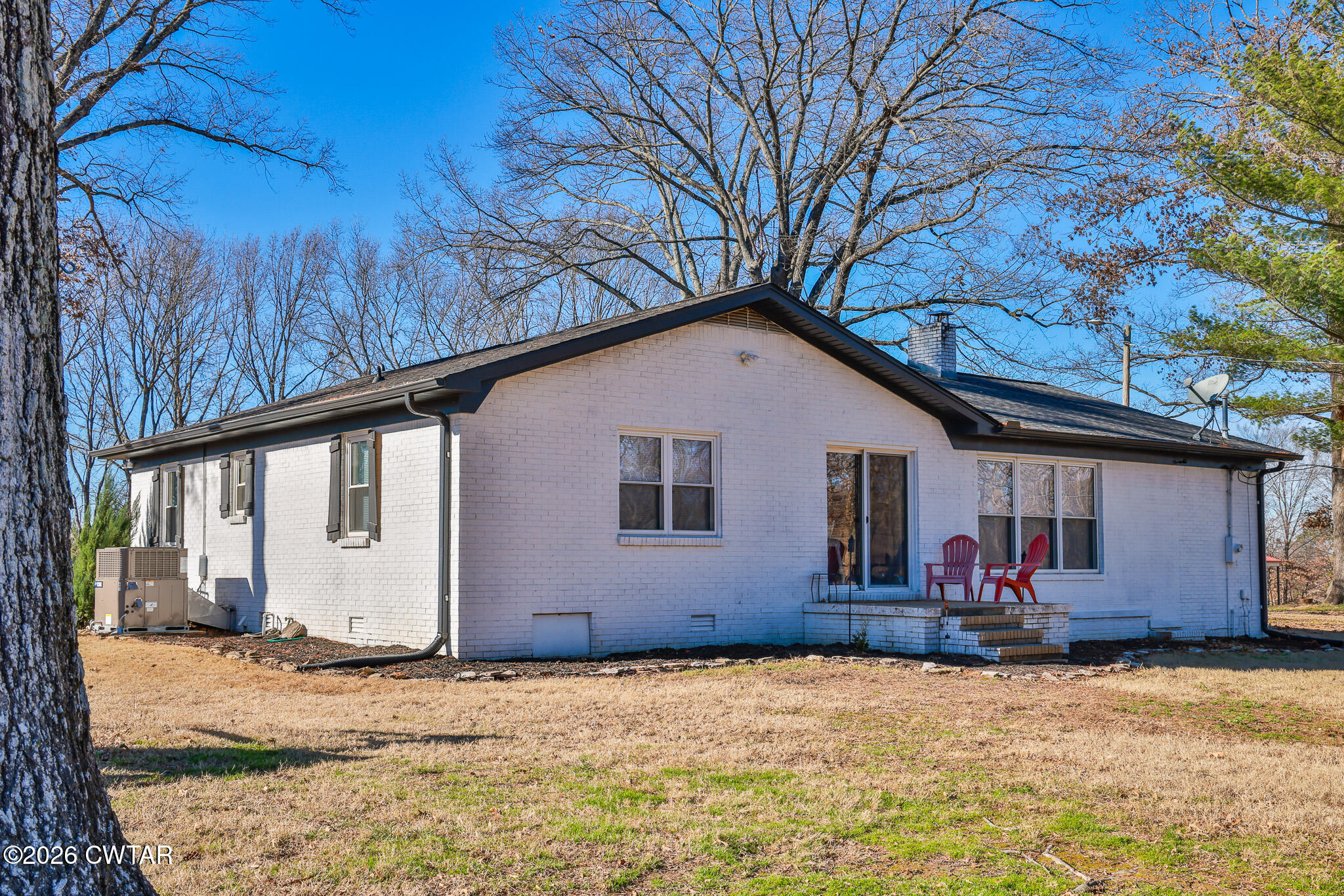 125 Old Dyer-Trenton Road Dyer, TN 38330 - Photo 25 of 40 a house with trees in the background