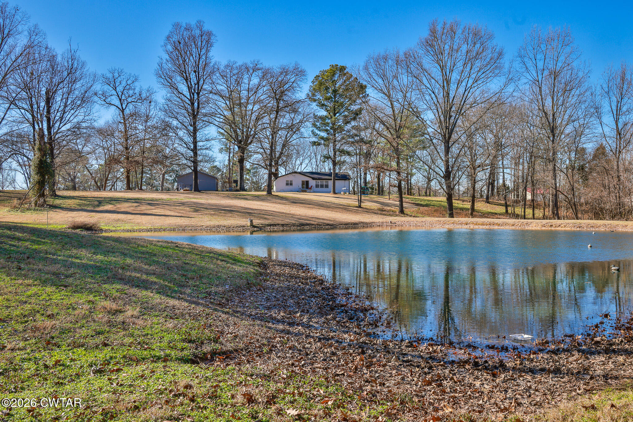 125 Old Dyer-Trenton Road Dyer, TN 38330 - Photo 36 of 40 a lake view with large trees