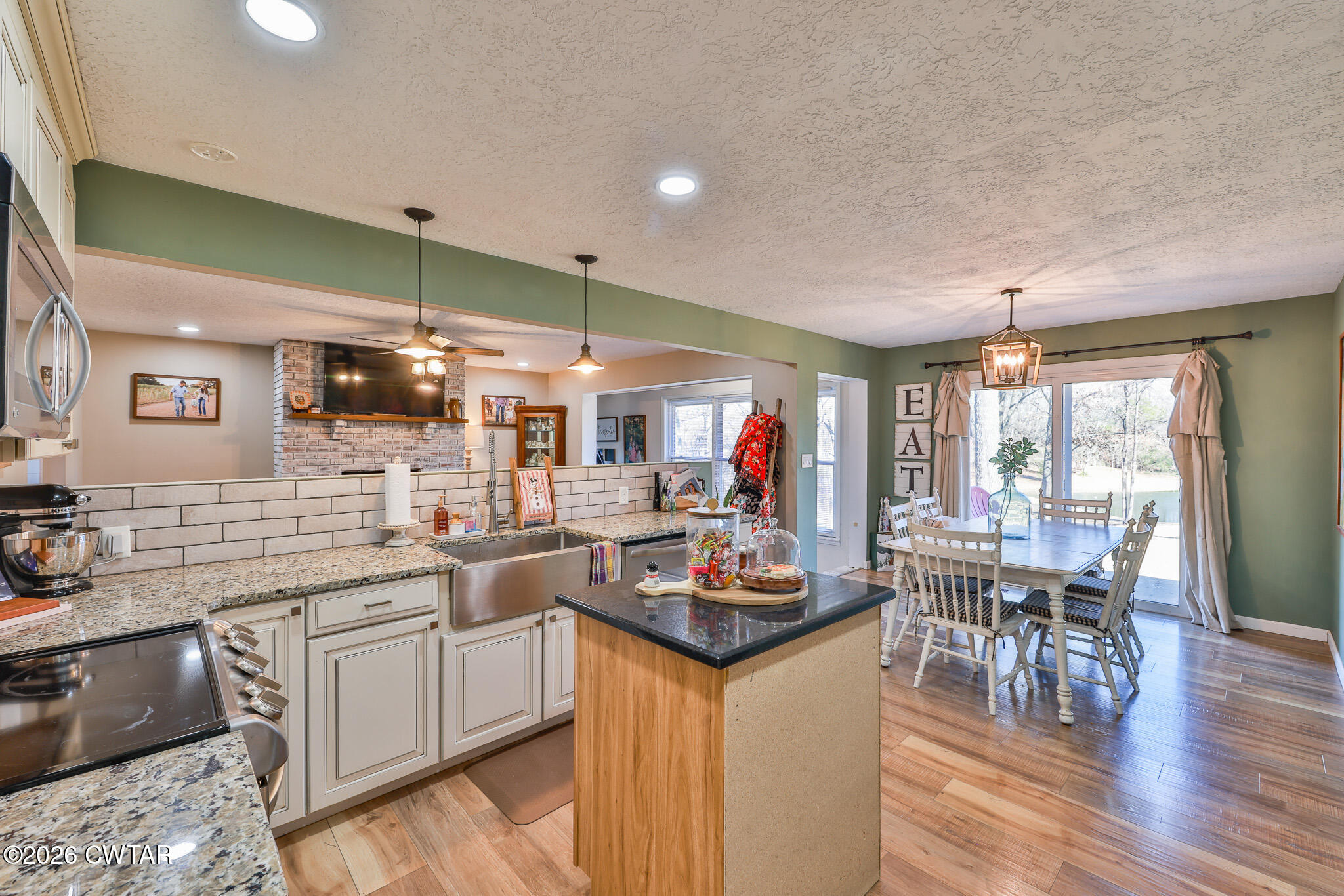 125 Old Dyer-Trenton Road Dyer, TN 38330 - Photo 7 of 40 a kitchen with lots of counter top space and dining table
