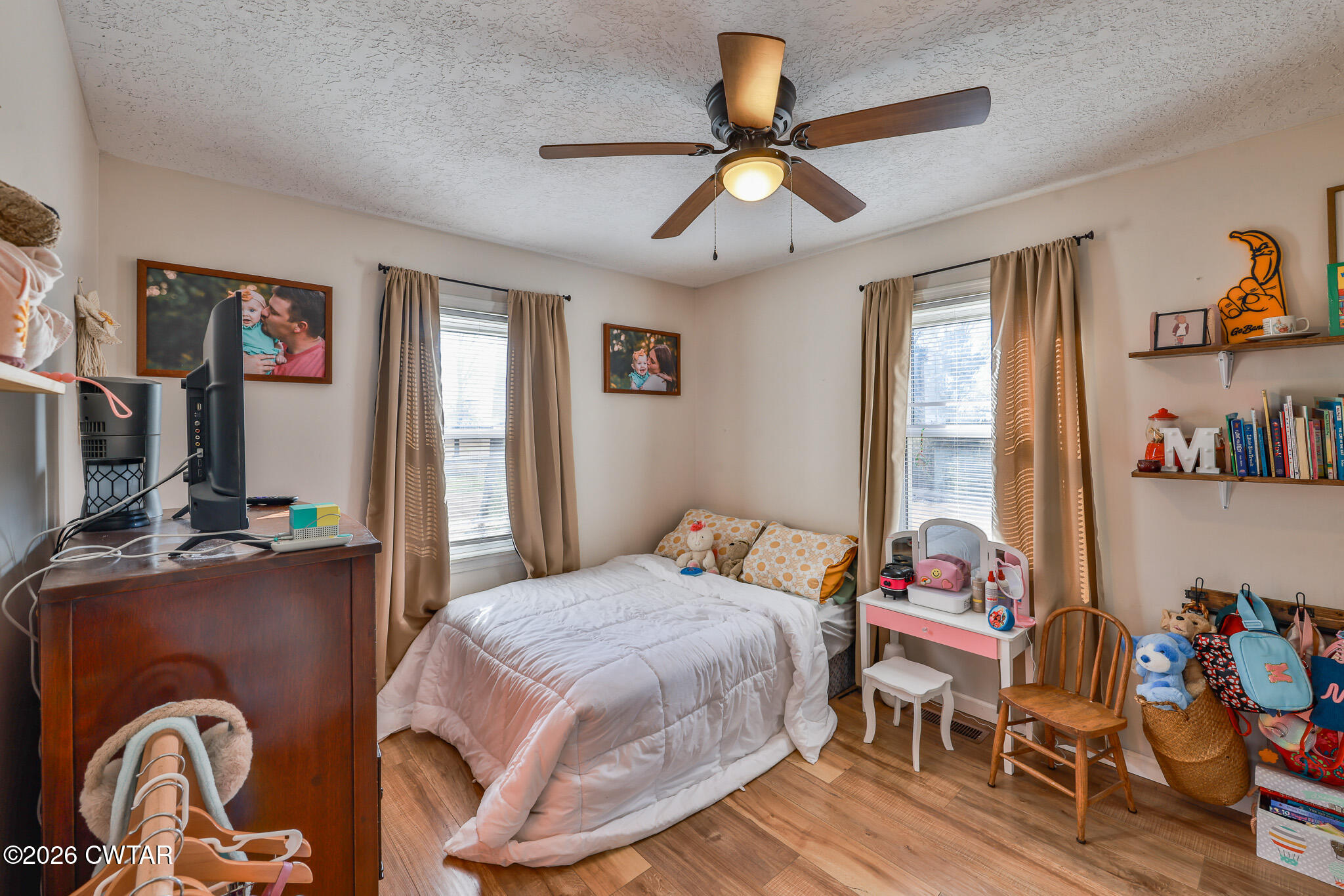 125 Old Dyer-Trenton Road Dyer, TN 38330 - Photo 8 of 40 a bedroom with a bed and a chandelier