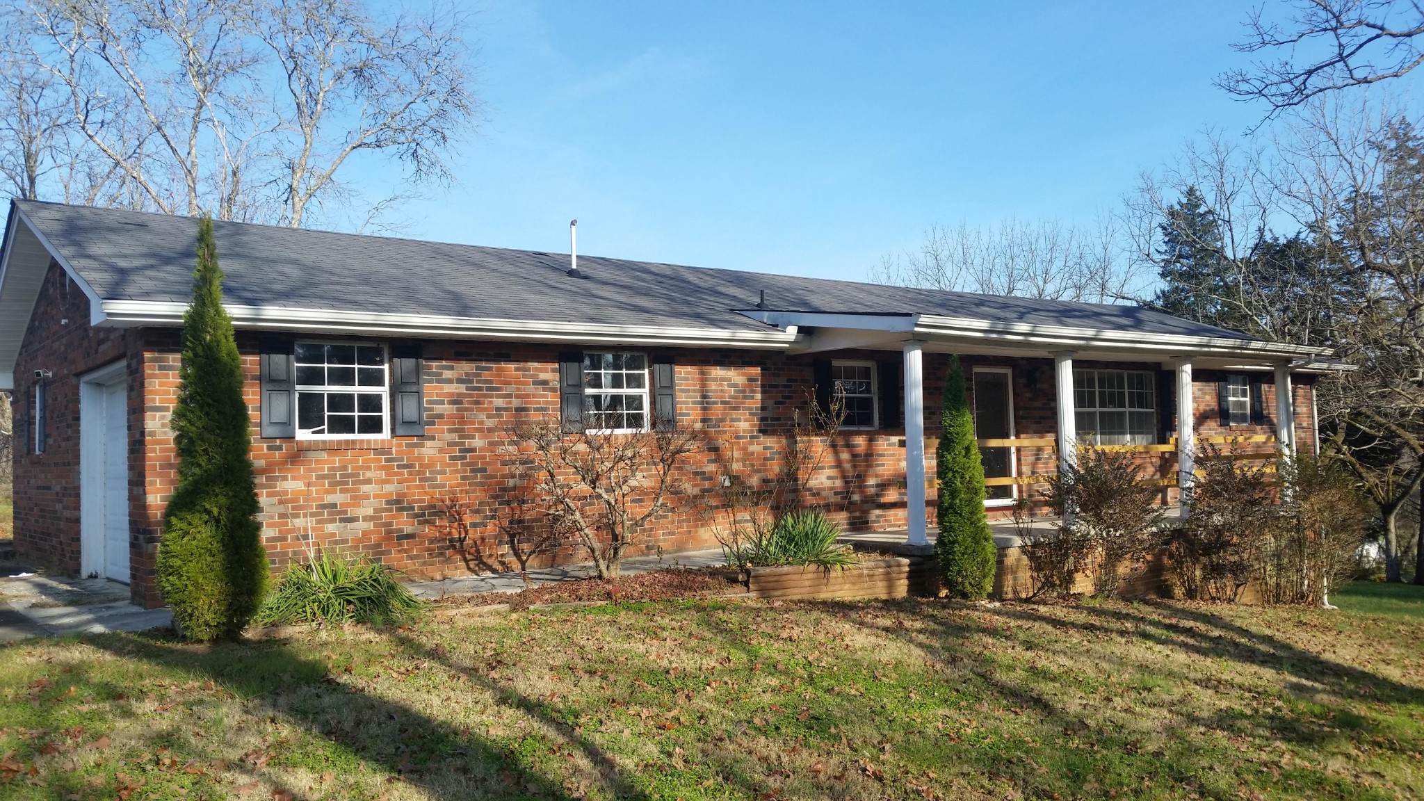 front view of house with a yard