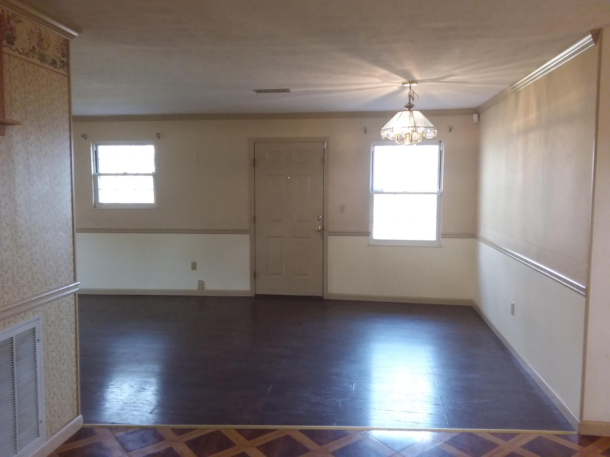152 Lost Ridge Road Clinton, TN 37716 - Photo 6 of 22 an empty room with wooden floor and windows