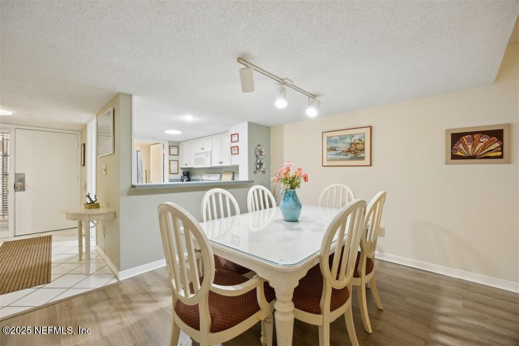 2021 Beachwood Road Fernandina Beach, FL 32034 - Photo 10 of 32 a view of a dining room with furniture