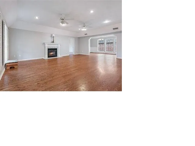 a open hall with wooden floors