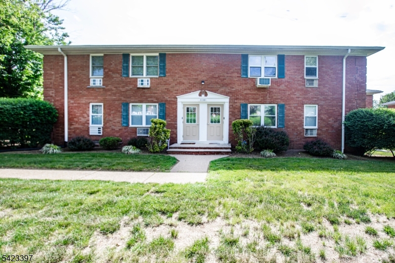 1130 Valley Road, Unit 2B Wayne, NJ 07470 - Photo 7 of 47 a front view of a house with garden