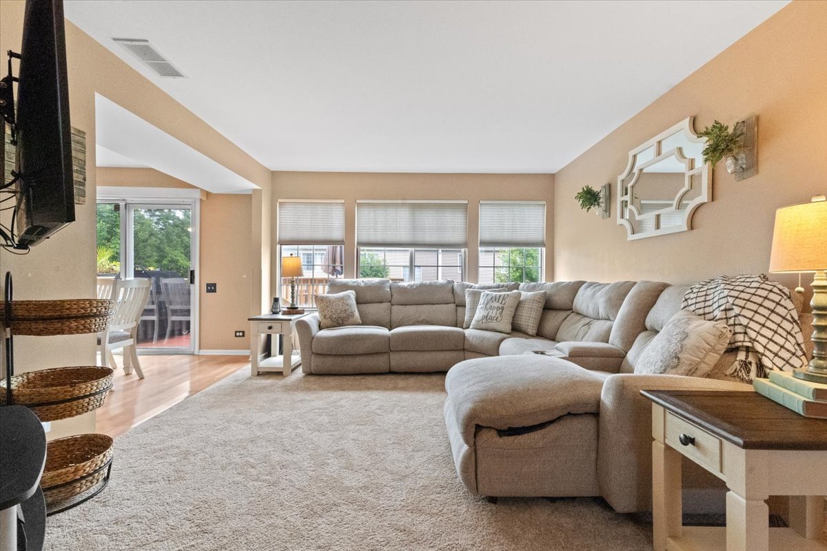 423 Spaulding Road Bartlett, IL 60103 - Photo 4 of 28 a living room with furniture and a large window
