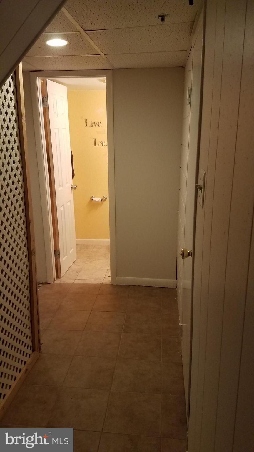 3219 Rhett Road Philadelphia, PA 19154 - Photo 22 of 28 Lower level hall to Half Bath and Laundry Room