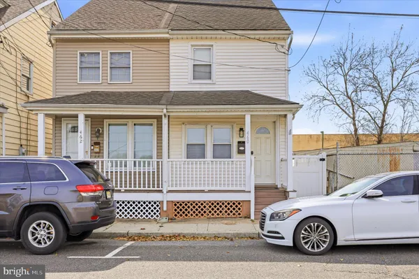a car parked in front of a house