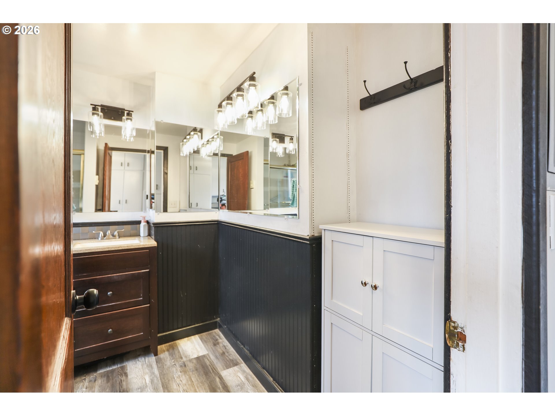 409 Northeast Court Street Dufur, OR 97021 - Photo 13 of 38 a kitchen view with wooden floor and windows