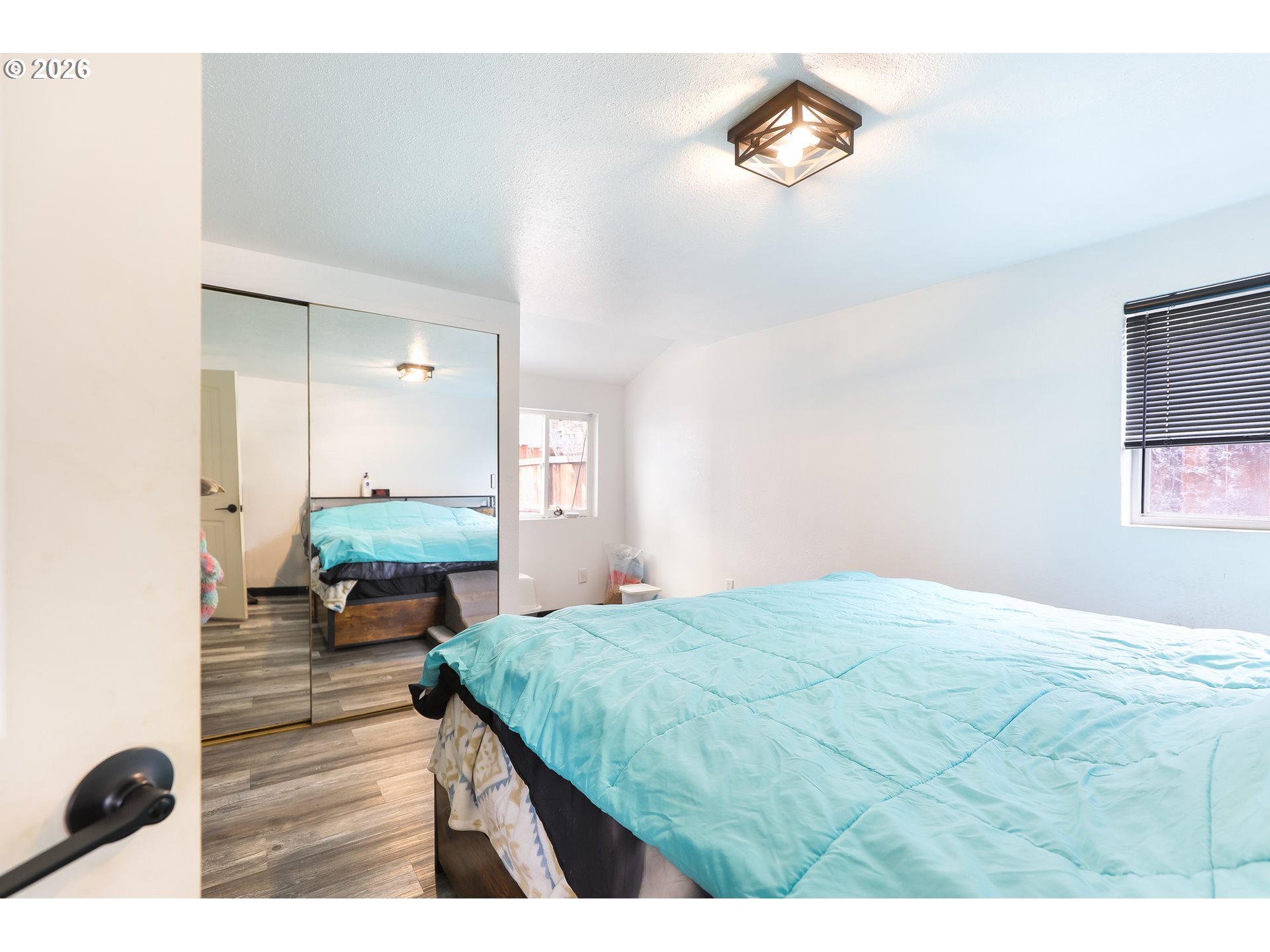 409 Northeast Court Street Dufur, OR 97021 - Photo 22 of 38 a living room with a bed furniture and a window