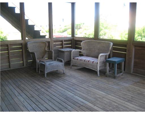 21 Sand Hill Cove Road Narragansett, RI 02882 - Photo 11 of 16 Patio/Deck. Large screened porch for entertaining.