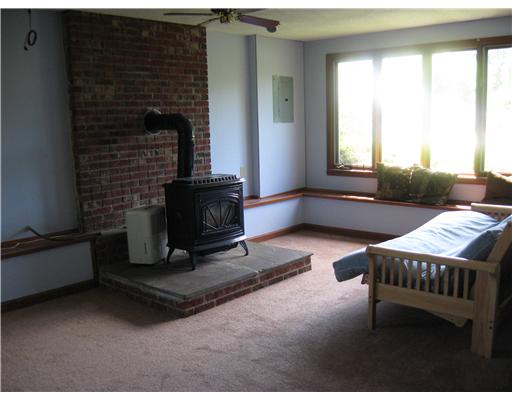 21 Sand Hill Cove Road Narragansett, RI 02882 - Photo 9 of 16 Den/Family/Great Room. Family room with gas firplace. Sliders to large screened porch.