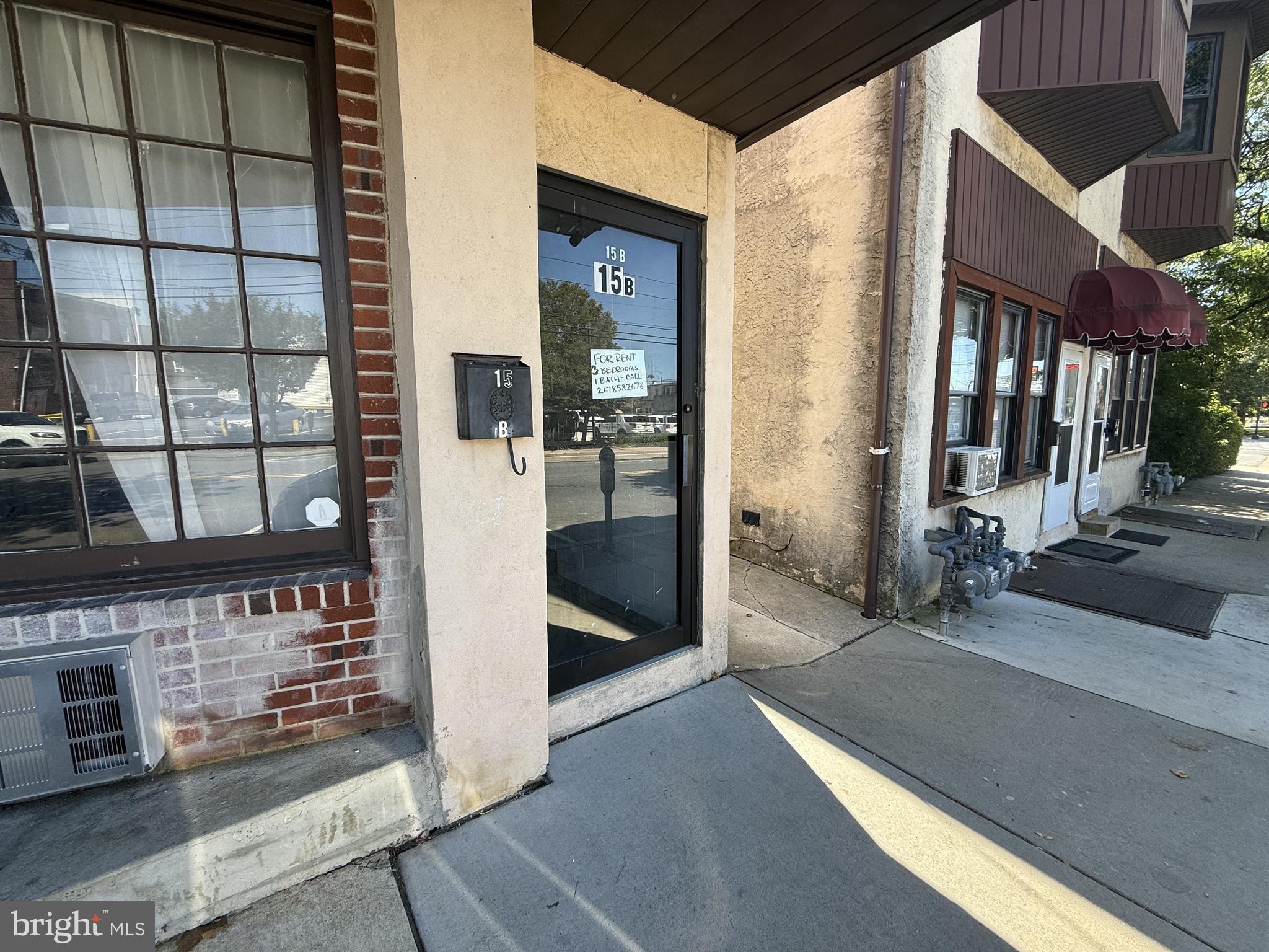 15 West 10th Street, Unit B Marcus Hook, PA 19061 - Photo 2 of 12 a view of a lobby with a rug