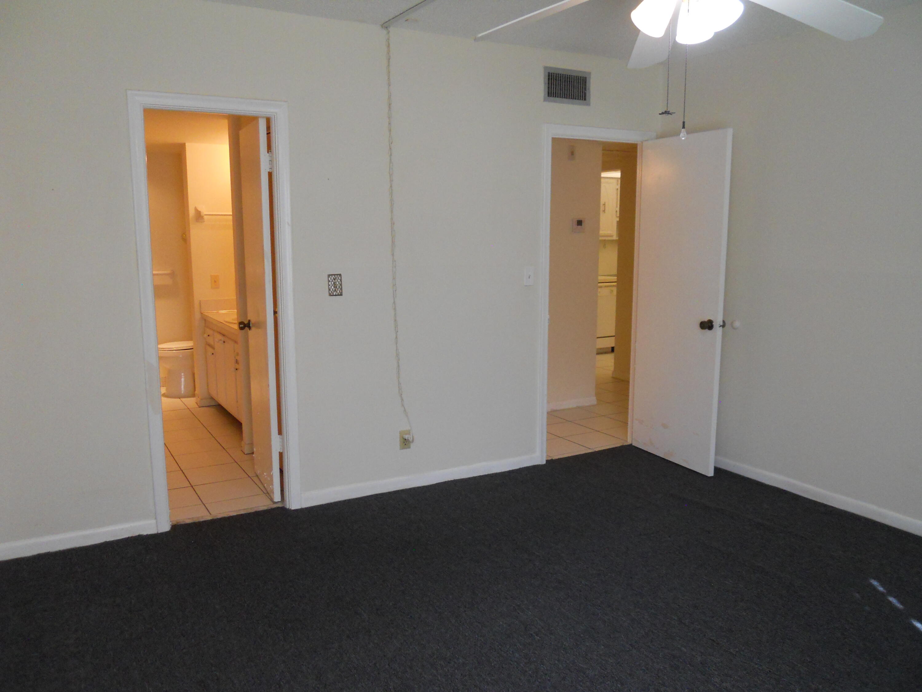 250 Northeast 20th Street, Unit 123S Boca Raton, FL 33431 - Photo 21 of 34 Master Bedroom