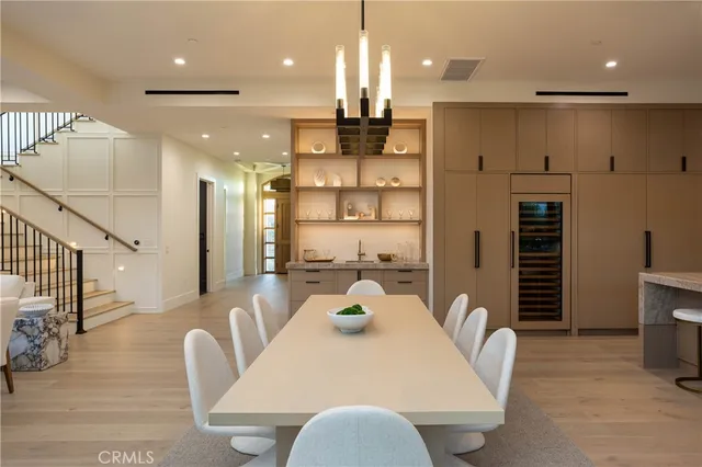 a kitchen with lots of counter space and living room view