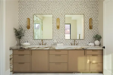 a dining room with furniture a chandelier and wooden floor