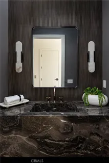 a kitchen with a cabinets and wooden floor