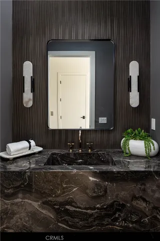 a kitchen with a cabinets and wooden floor