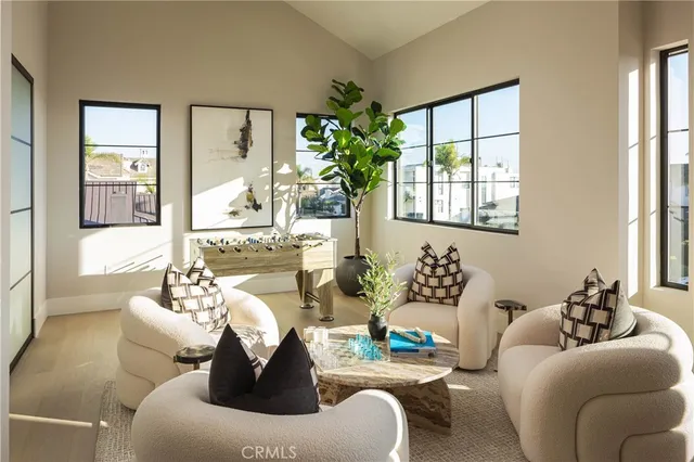 a bathroom with a granite countertop sink a toilet and tub