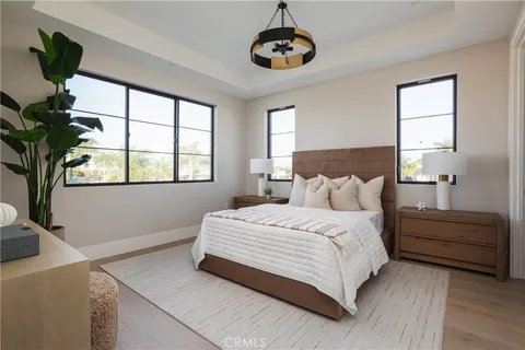 a view of an empty room with a ceiling fan
