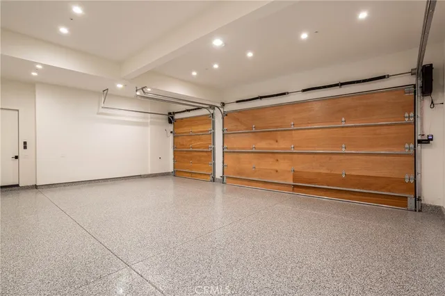 a terrace with outdoor seating and city view