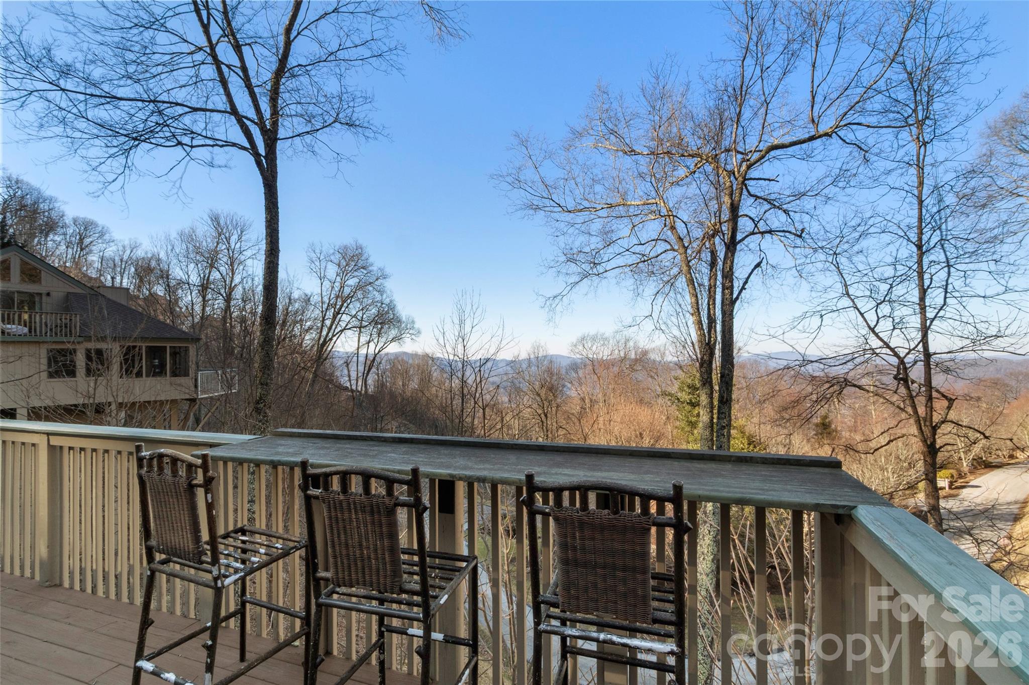 71 Ivy Ridge Road Burnsville, NC 28714 - Photo 13 of 23 a view of a wooden deck next to a yard