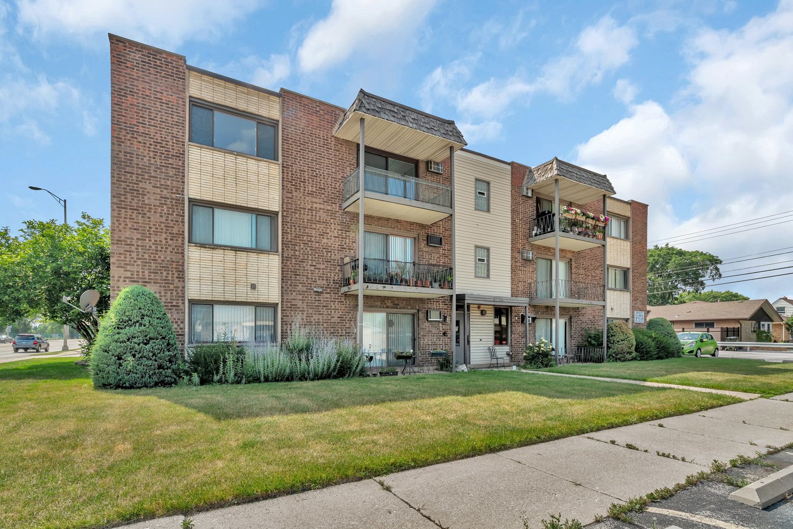 5724 West 111th Street, Unit 3A Chicago Ridge, IL 60415 - Photo 1 of 12 a view of a building with a yard