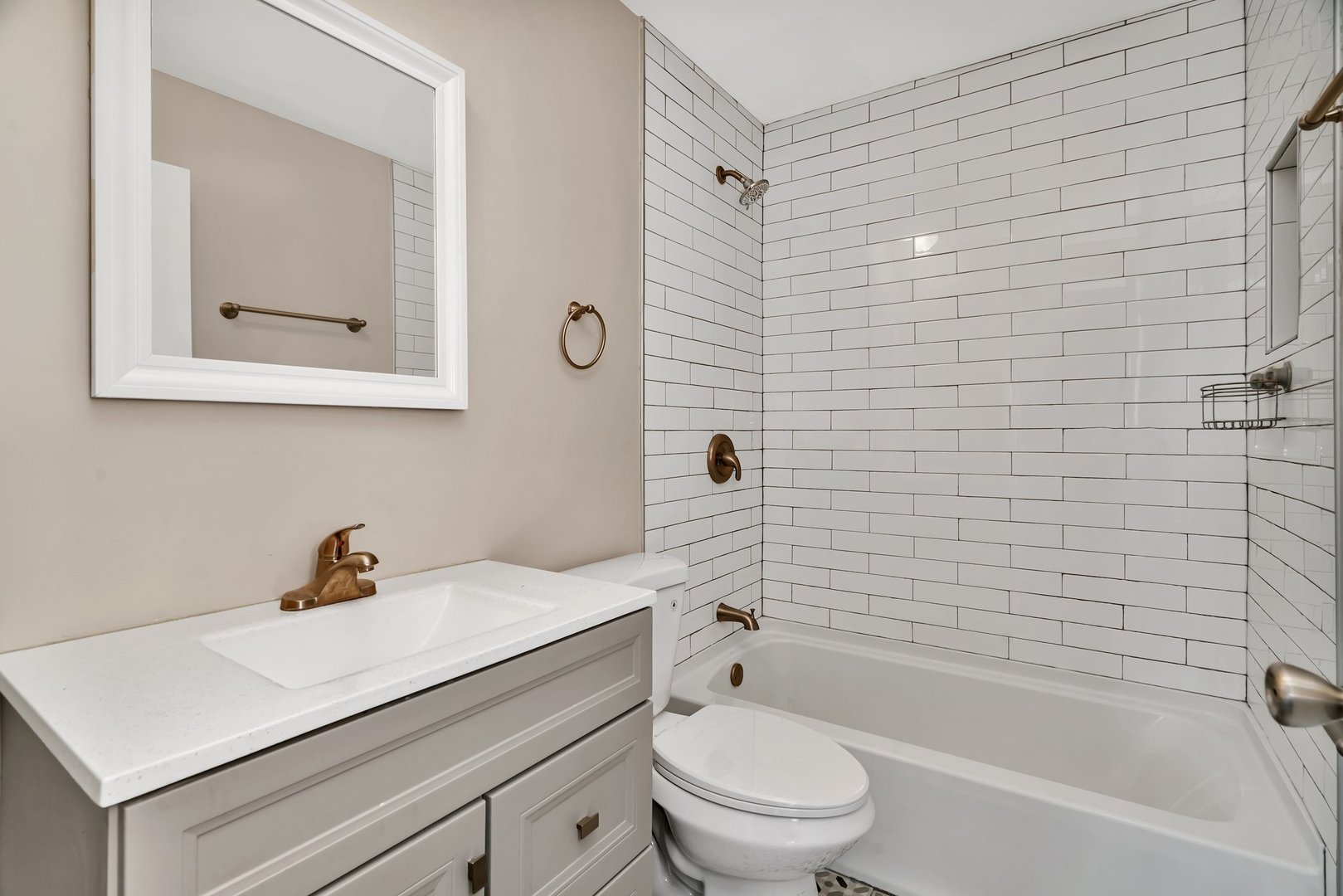 5724 West 111th Street, Unit 3A Chicago Ridge, IL 60415 - Photo 11 of 12 a bathroom with a sink a toilet and shower