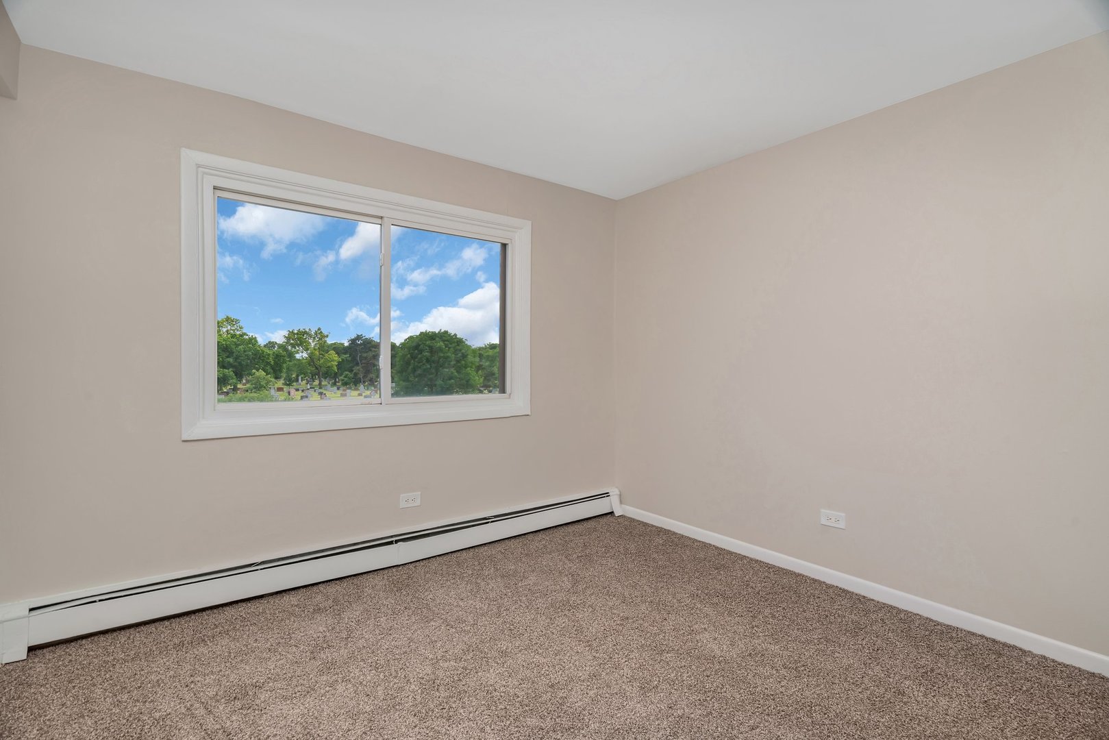 5724 West 111th Street, Unit 3A Chicago Ridge, IL 60415 - Photo 10 of 12 an empty room with a window