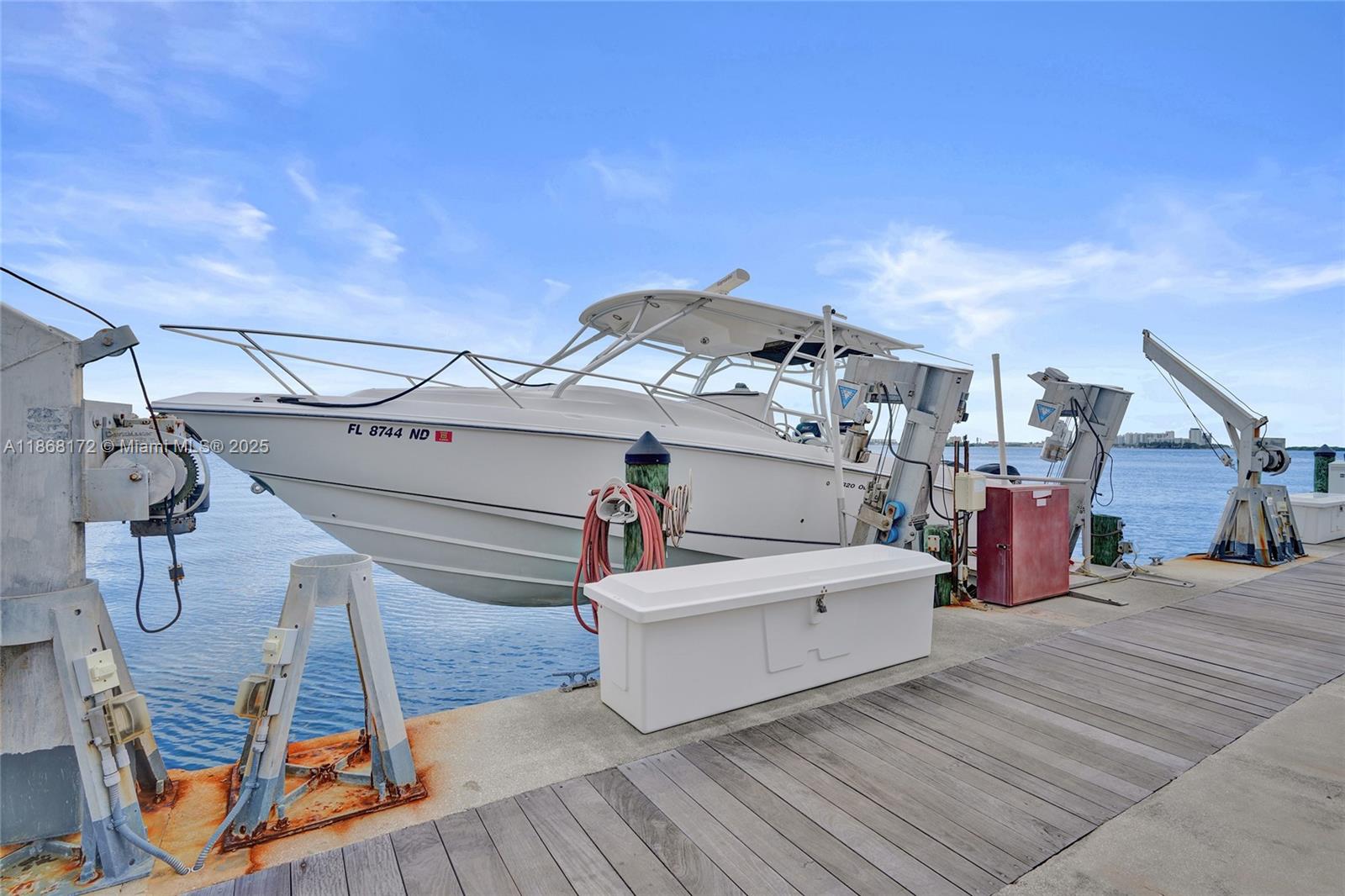 4000 Towerside Terrace Miami, FL 33138 - Photo 17 of 18 a view of a terrace with wooden floors