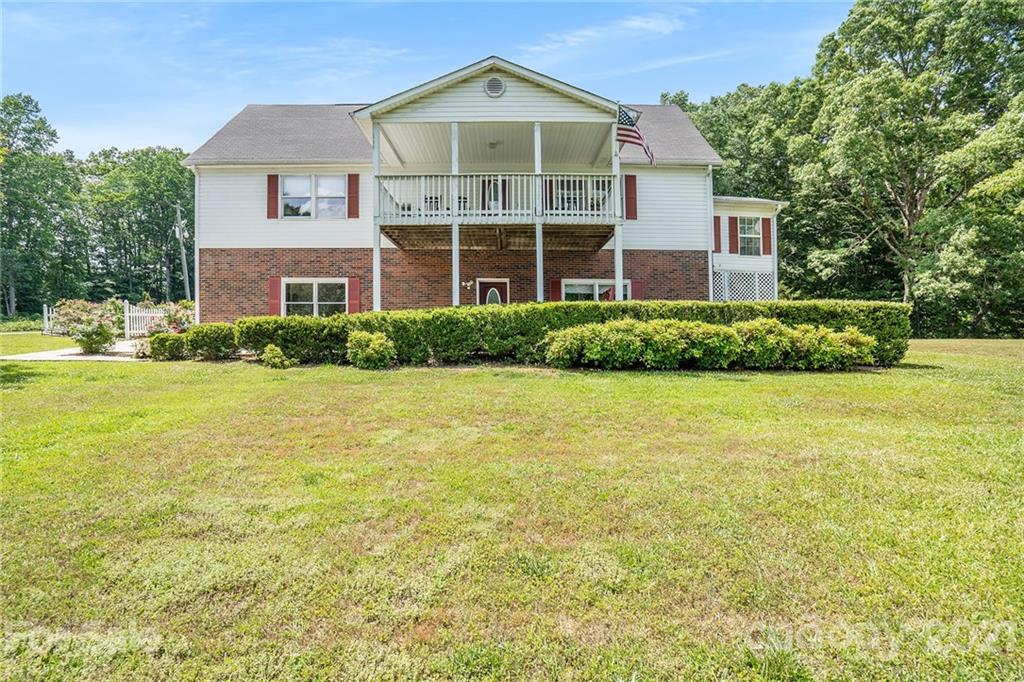 1251 Crossland Road Clover, SC 29710 - Photo 2 of 45 a front view of a house with a yard