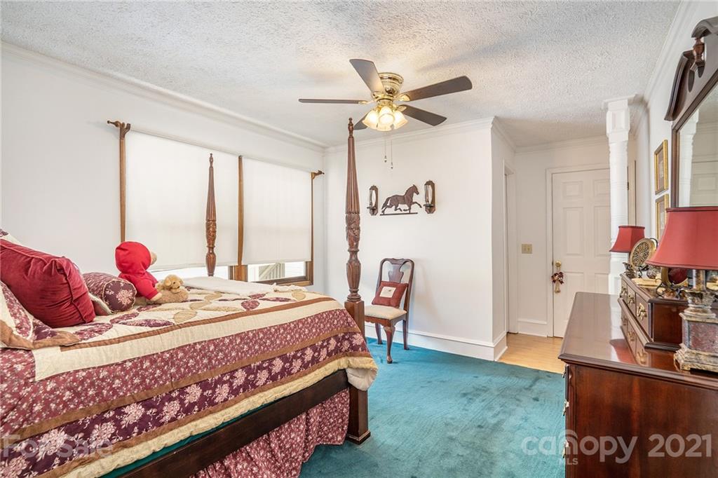1251 Crossland Road Clover, SC 29710 - Photo 20 of 45 a bed room with a bed and a chair