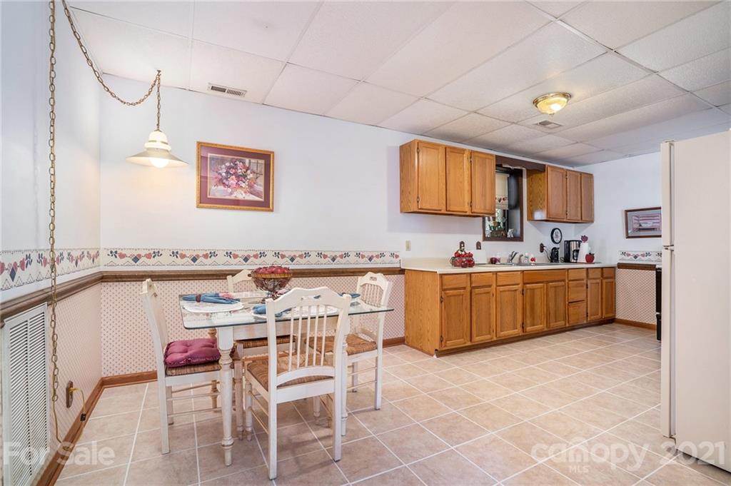 1251 Crossland Road Clover, SC 29710 - Photo 27 of 45 a kitchen with a sink cabinets and window