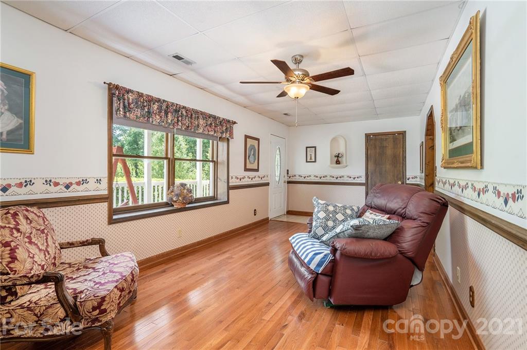 1251 Crossland Road Clover, SC 29710 - Photo 31 of 45 a living room with furniture and a large window