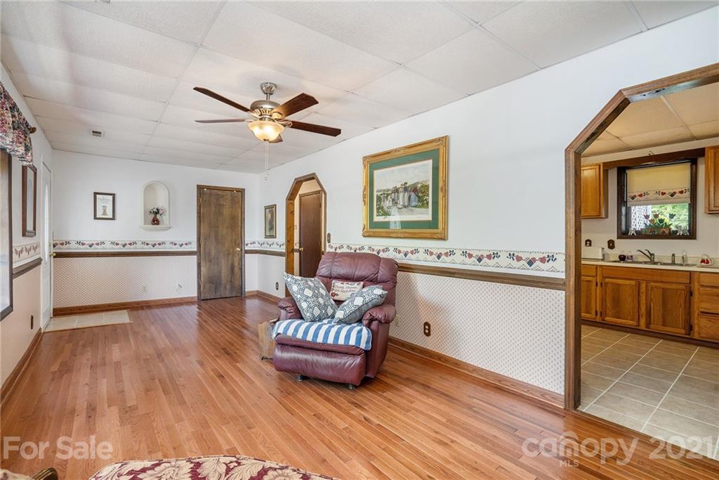 1251 Crossland Road Clover, SC 29710 - Photo 32 of 45 a living room with furniture and a wooden floor