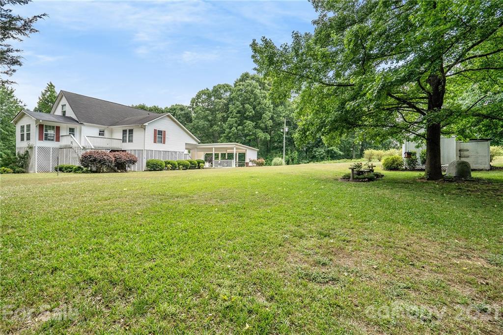 1251 Crossland Road Clover, SC 29710 - Photo 43 of 45 a view of a house with a big yard and large trees