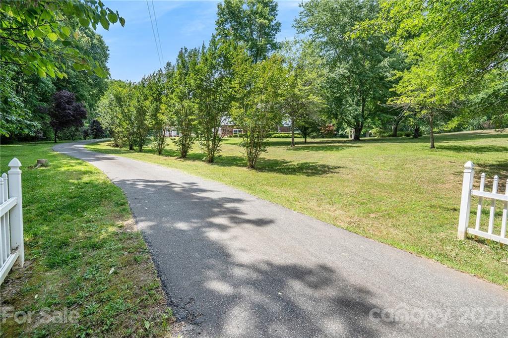 1251 Crossland Road Clover, SC 29710 - Photo 44 of 45 a view of a yard with a large trees