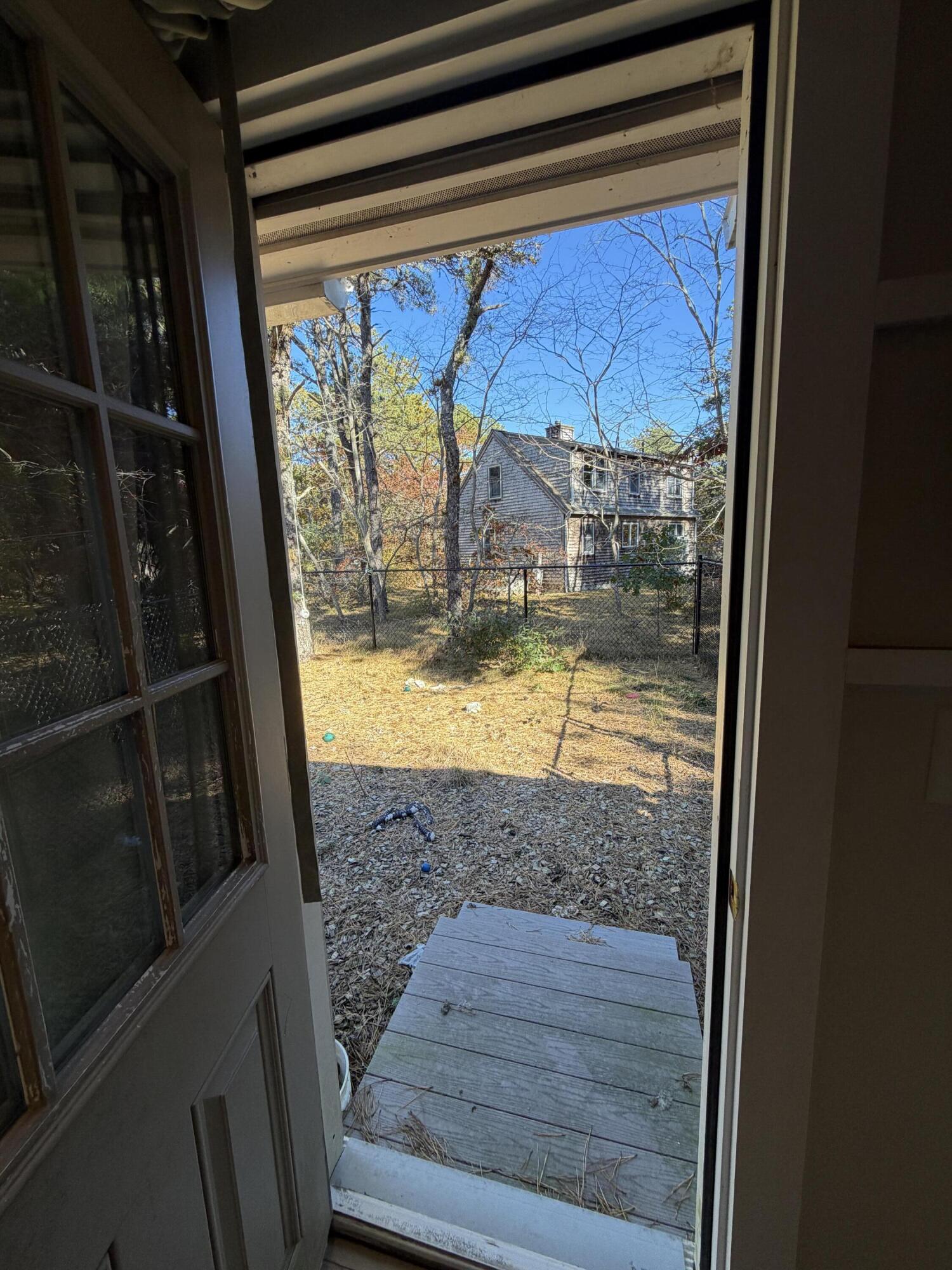 46 Spring Brook Road Wellfleet, MA 02667 - Photo 36 of 37 a view of swimming pool from a window