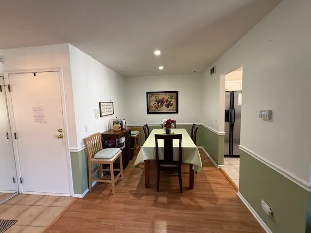 a view of a livingroom with furniture and wooden floor