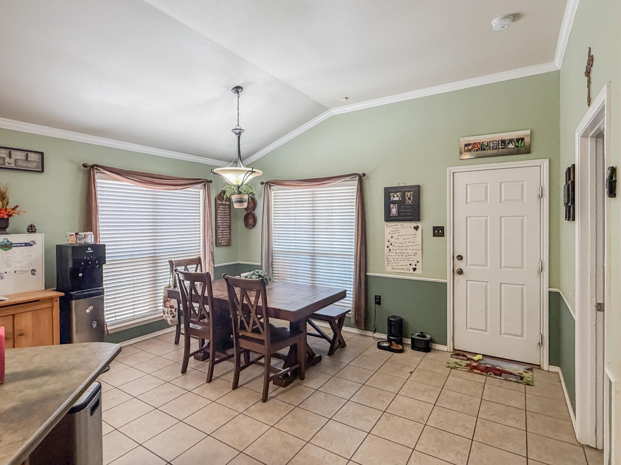 6715 91st Place Lubbock, TX 79424 - Photo 11 of 48 a view of a dining room with furniture