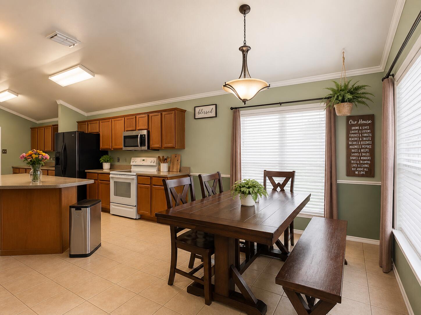 6715 91st Place Lubbock, TX 79424 - Photo 14 of 48 a view of a dining room with furniture window and wooden floor