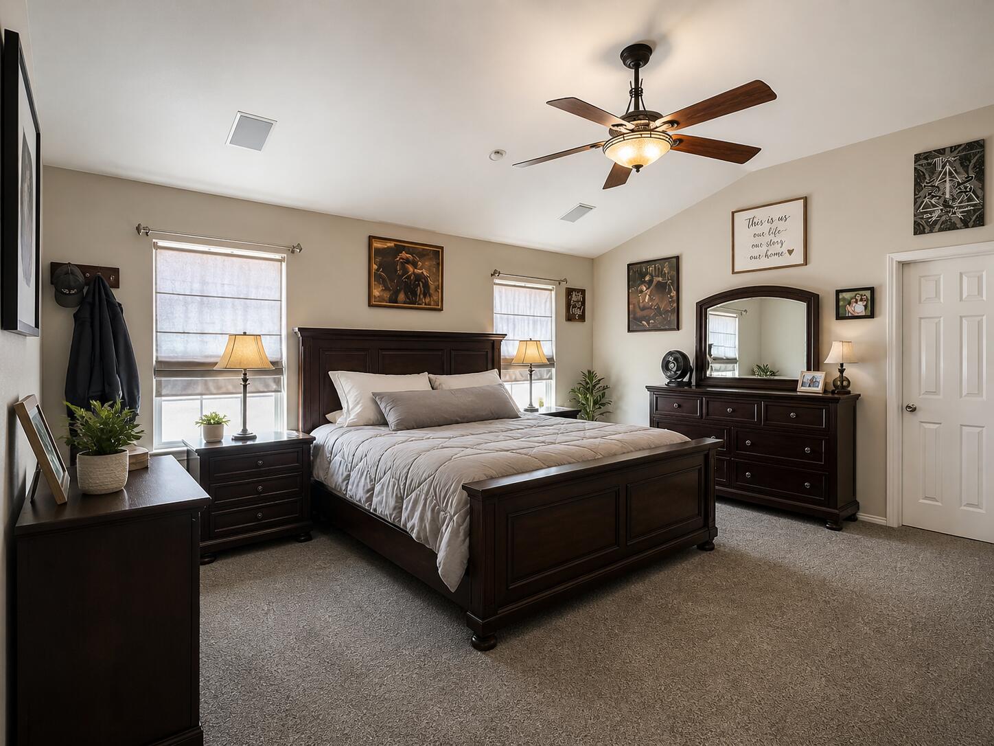 6715 91st Place Lubbock, TX 79424 - Photo 28 of 48 a living room with a bed furniture and a flat tv screen