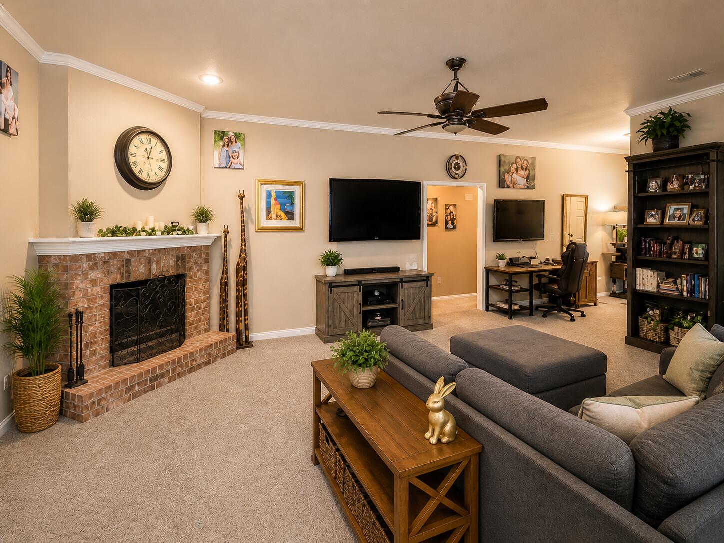 6715 91st Place Lubbock, TX 79424 - Photo 4 of 48 a living room with furniture a fireplace and a flat screen tv