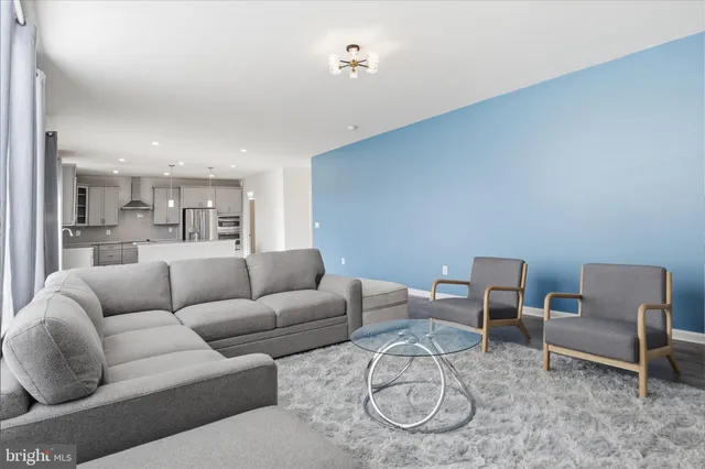 a view of kitchen with wooden floor
