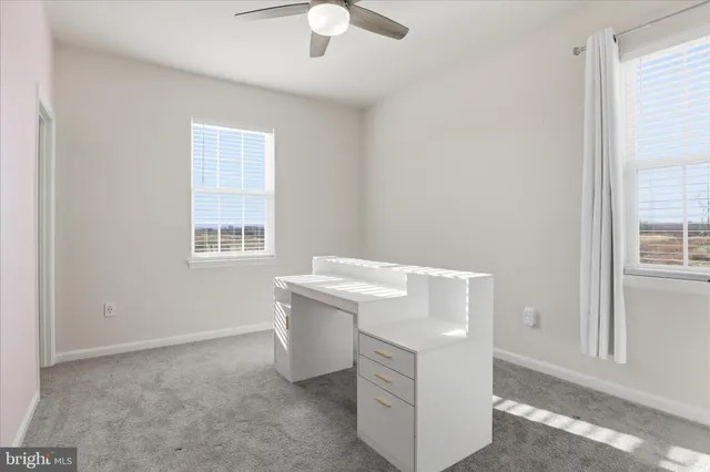 a view of room with window and hardwood