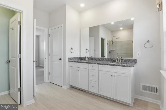 a bathroom with a shower and a toilet