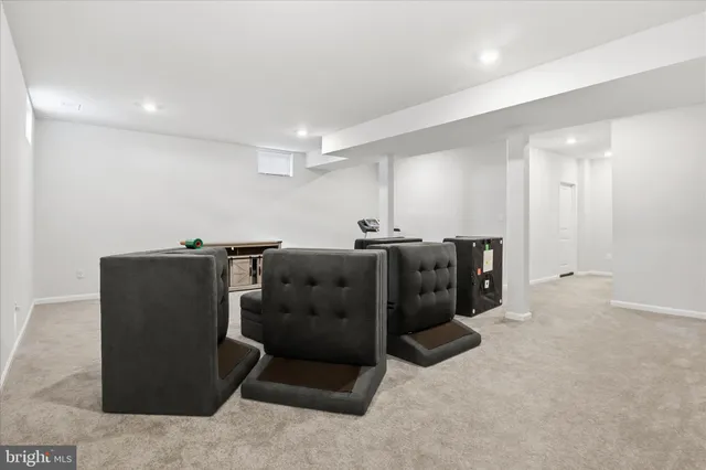 an empty room with closet and a chandelier fan